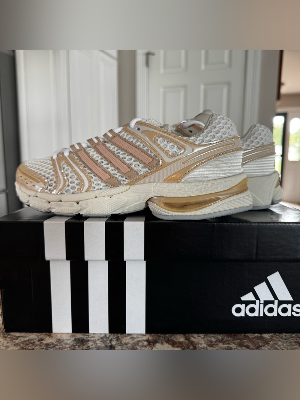 adidas Women’s White Sneakers with Gold and Blush Accents